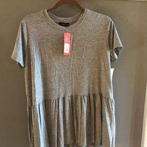 NWT size medium short sleeved peplum top